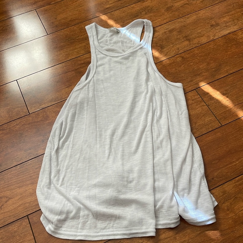 Free people soft white flowy tank top. Size small